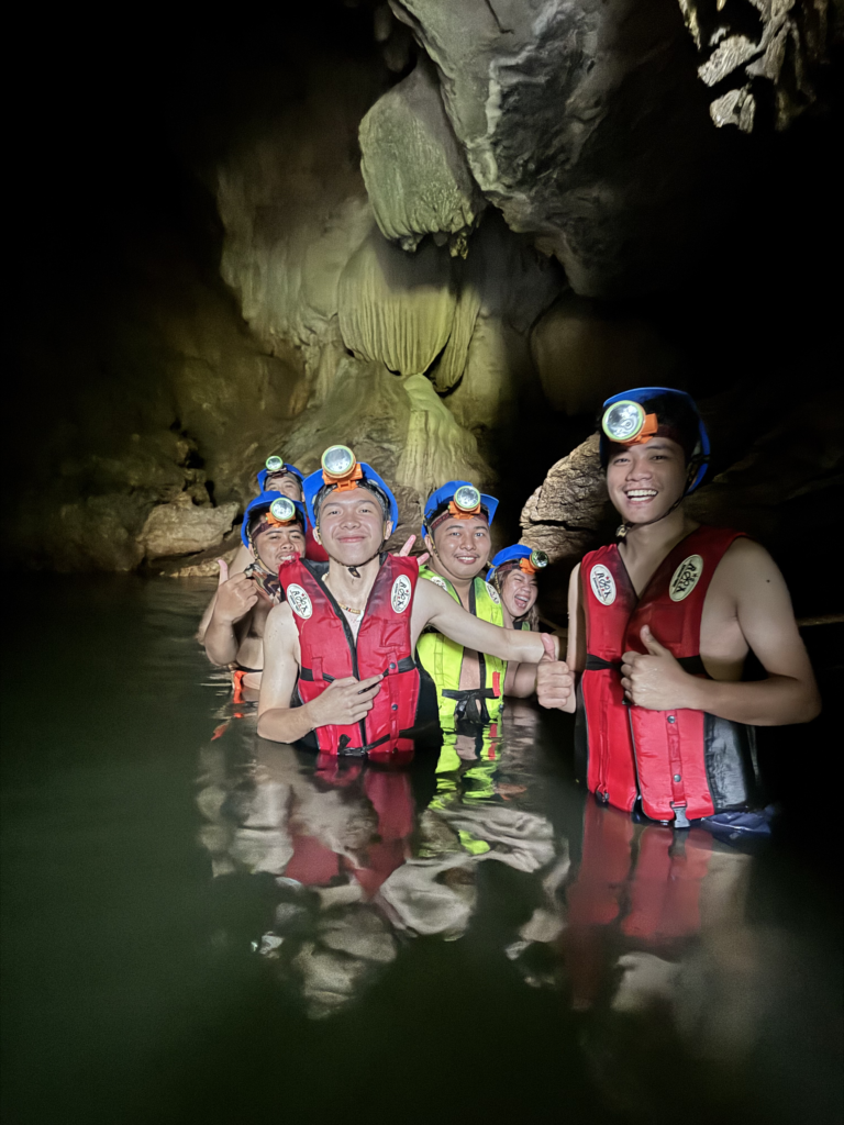 taking a swim inside tayangban cave pool