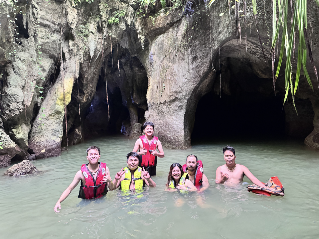 swimming at the lagoon in tayangban cave pool